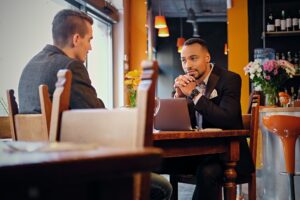 Men having a business meeting in a restaurant.